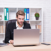 business-man-working-remotely-on-the-computer