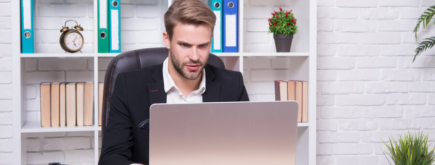 business-man-working-remotely-on-the-computer