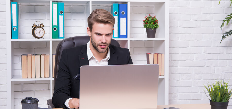 business-man-working-remotely-on-the-computer